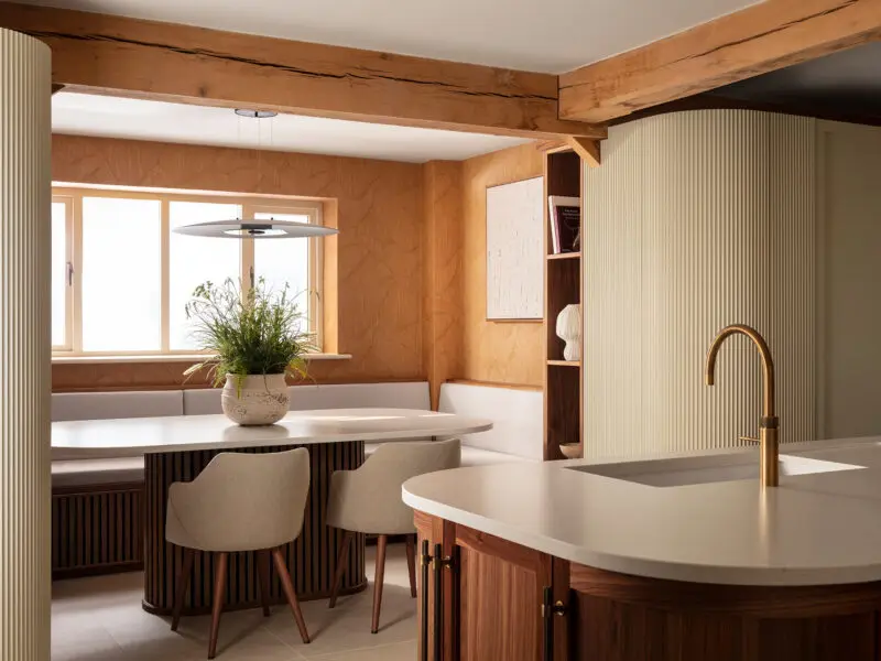 Worksop kitchen. Walnut doors, white granite worktops